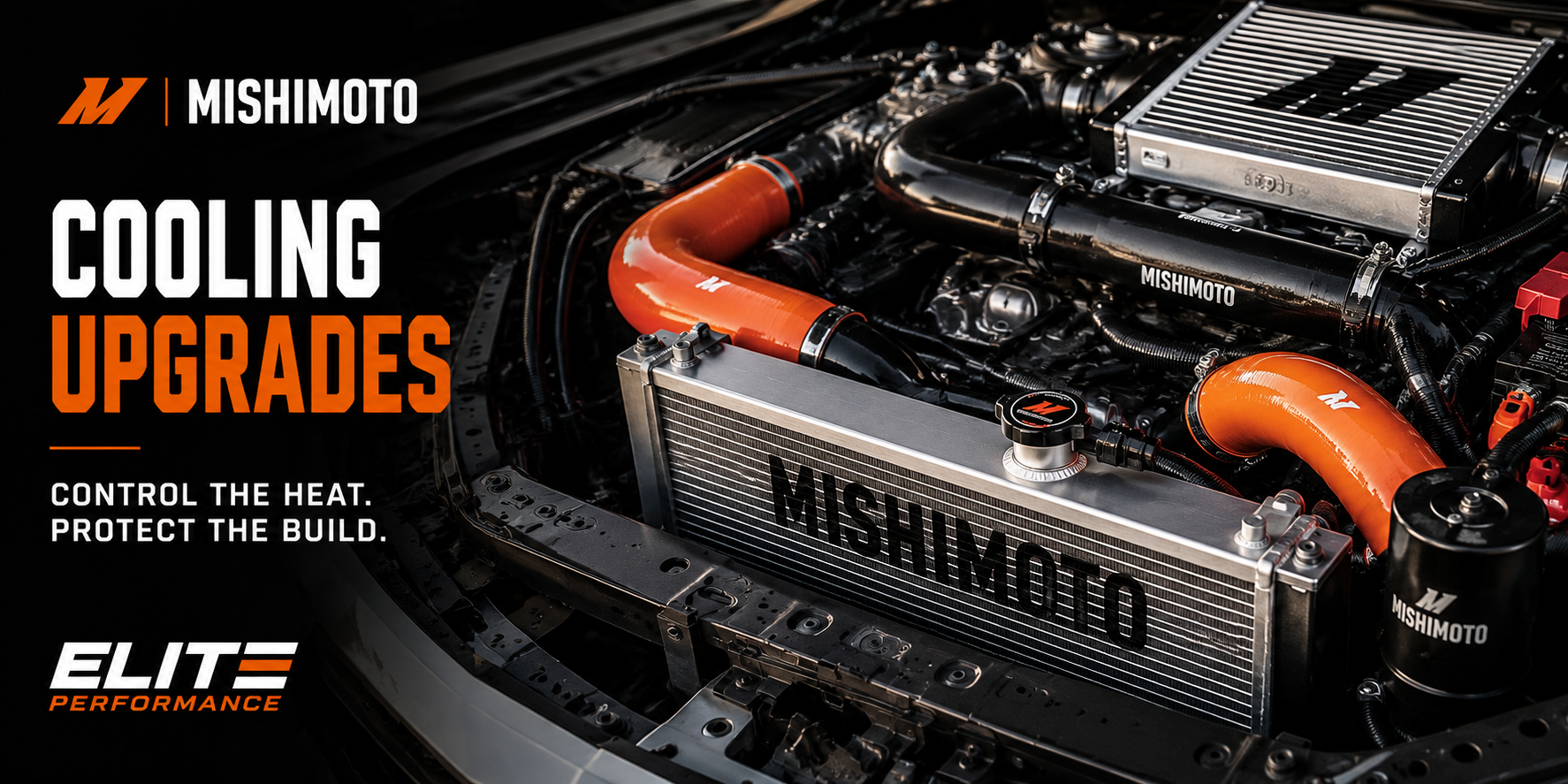 Performance engine bay with Mishimoto style cooling components, radiator, intercooler piping, and orange and black heat management styling
